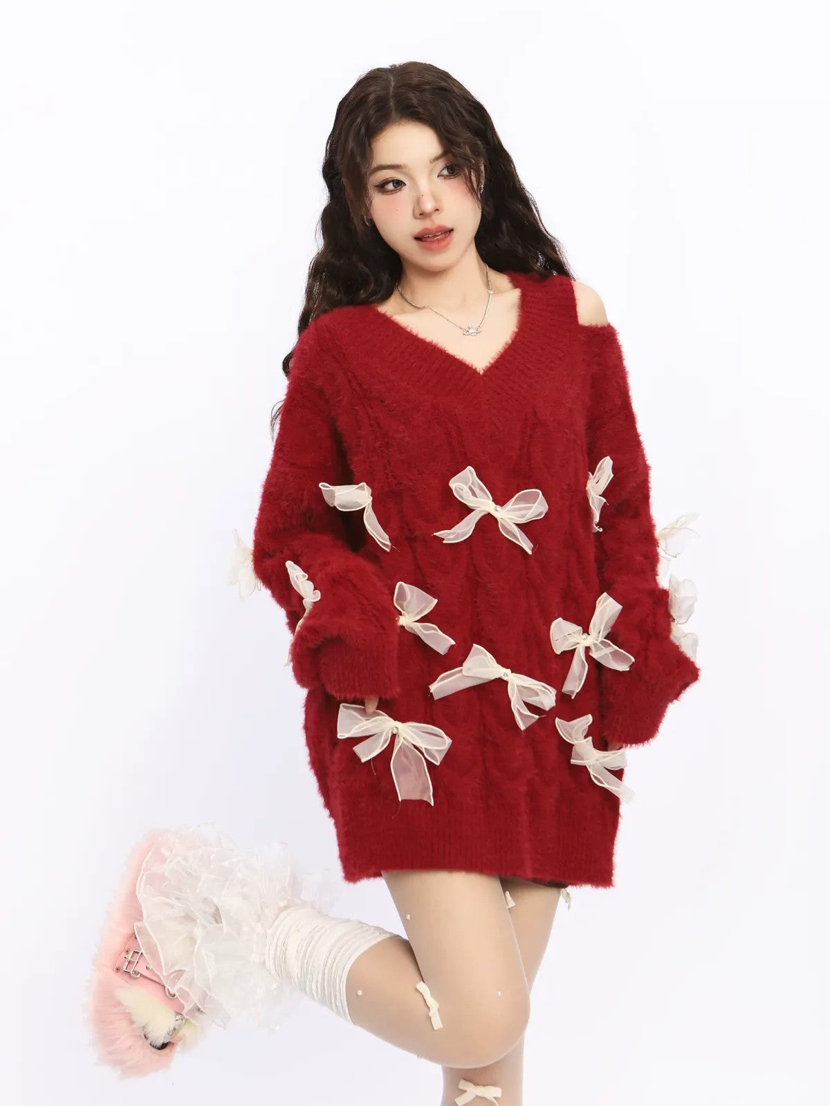 BIGGOLD STUDIO Bow Embellished Cold Shoulder Sweater in Red - On Model