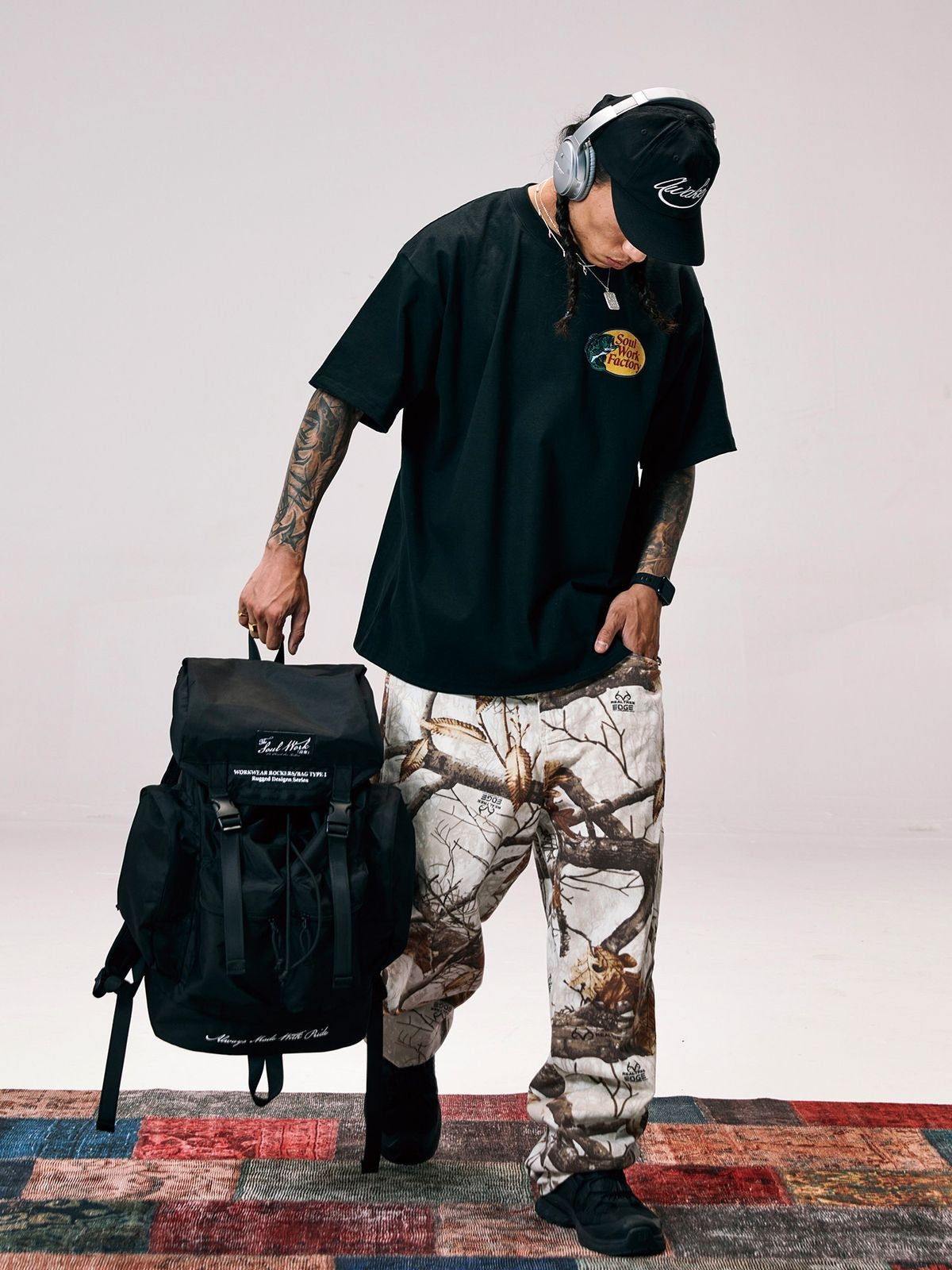 SWFI Far East Large Nylon Drawstring Backpack in Black - On Model