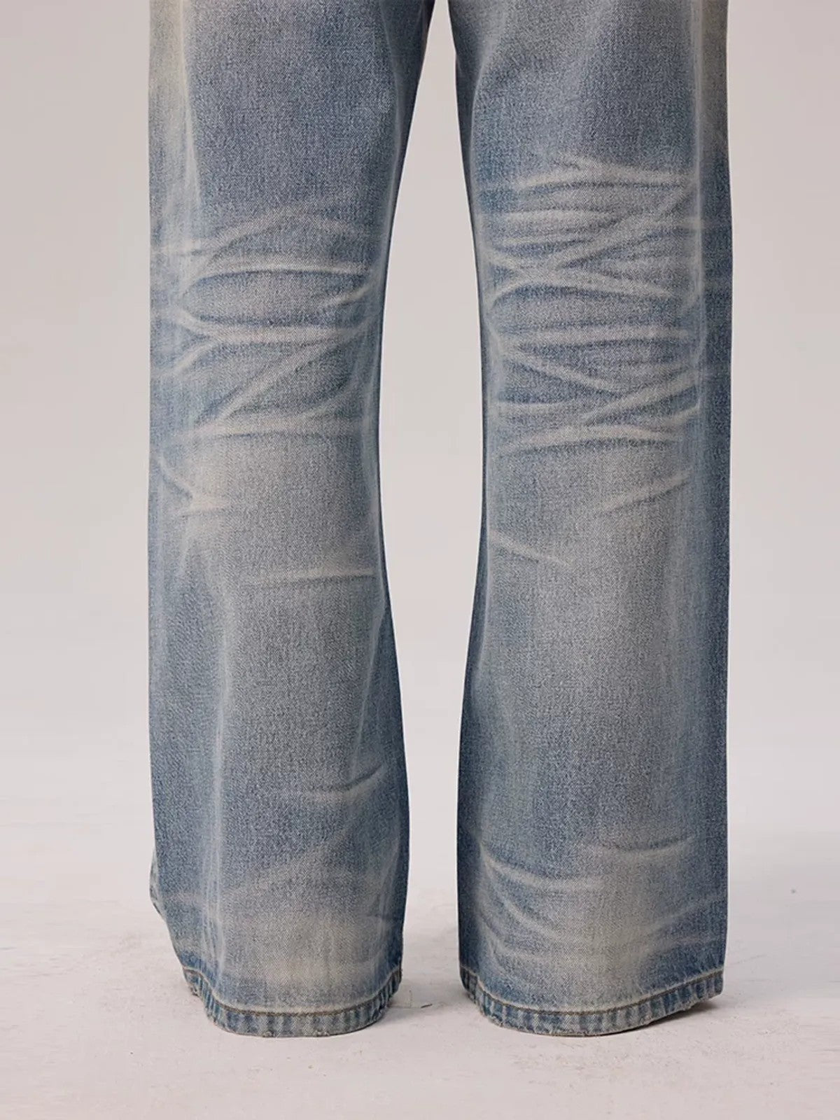 AFterTaste Distressed Whiskered Light Wash Jeans in Blue - On Model