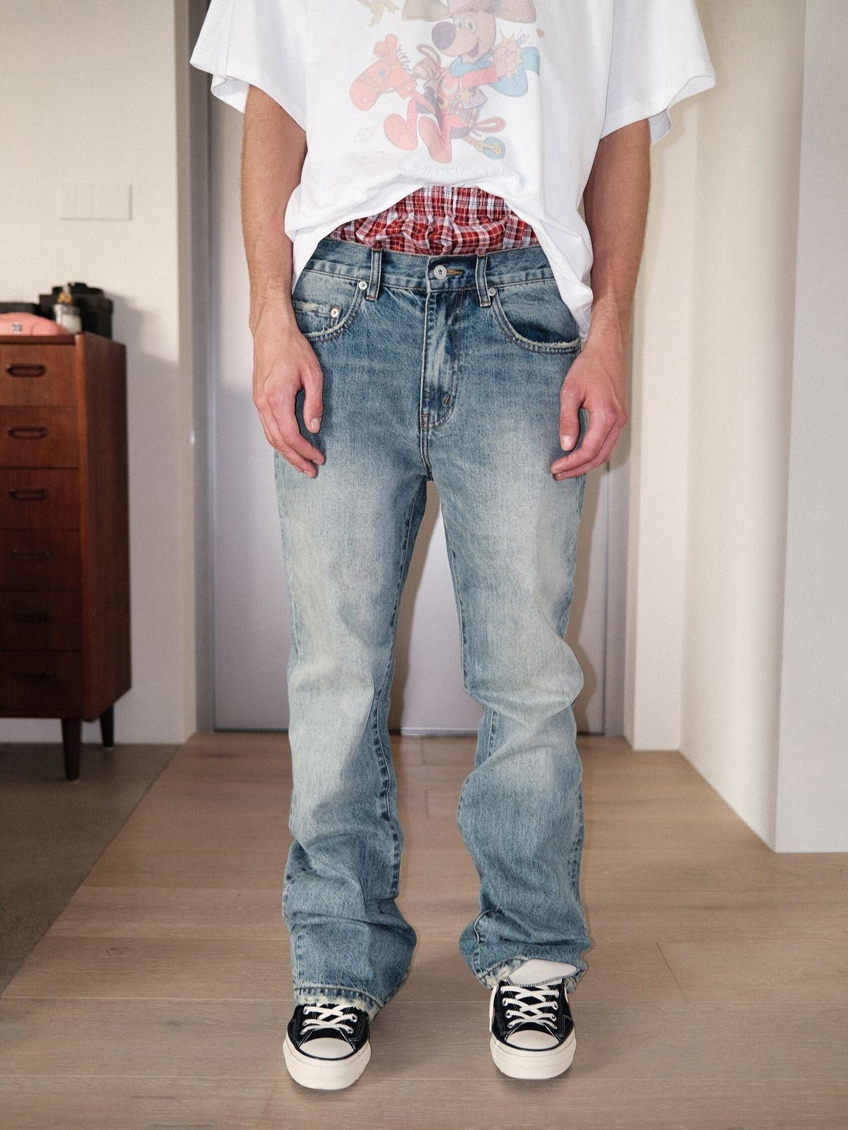 UNKNOWNWORLD Ice Blue Washed Micro Flare Jeans in Blue - On Model