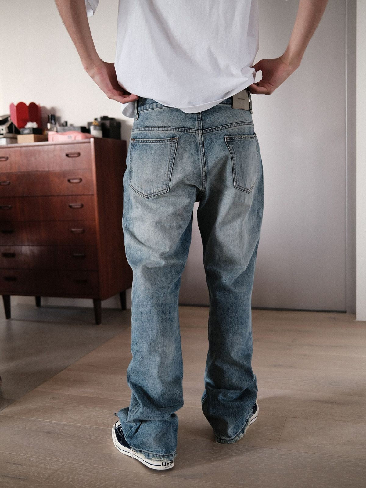 UNKNOWNWORLD Ice Blue Washed Micro Flare Jeans in Blue - On Model