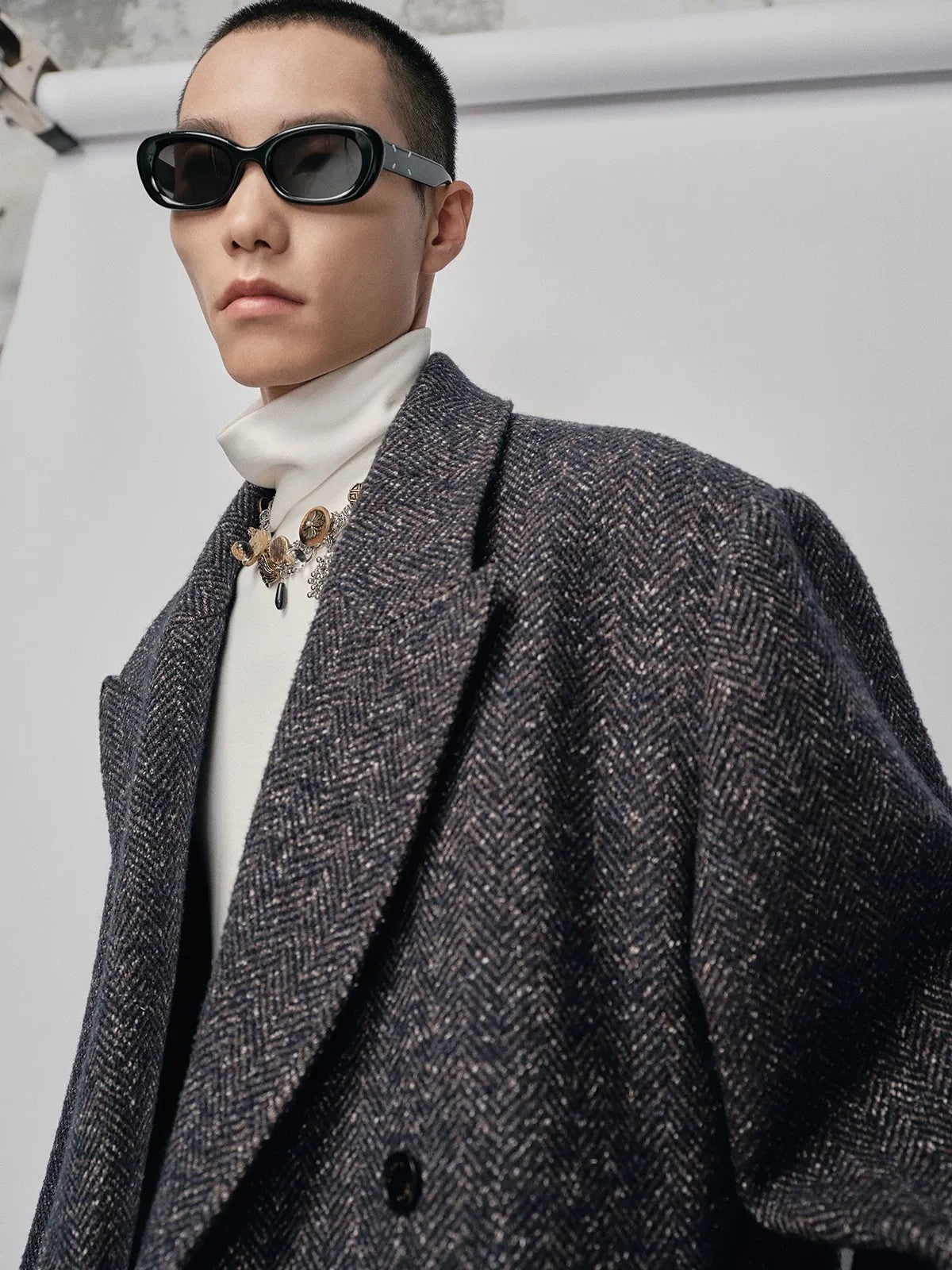 NANS Double Breasted Peak Lapel Wool Coat in Navy Blue - On Model