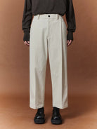 NANS Pleated Corduroy Cropped Trousers in White - On Model