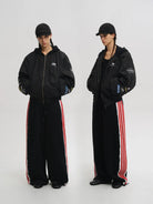 MASONPRINCE Hooded Racing Patch Puffer Jacket in Black - On Model