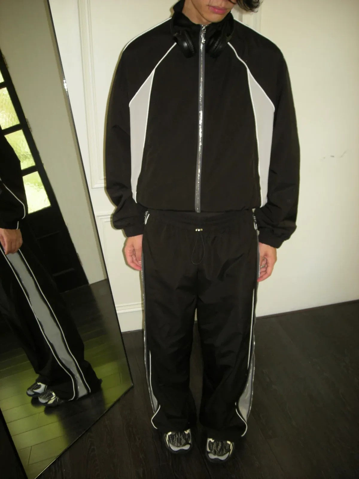 AFterTaste Oversized Zip Up Track Jacket in Black - On Model
