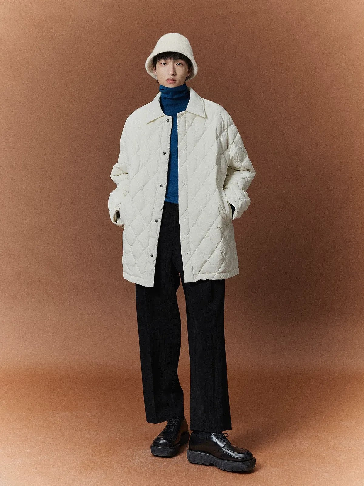 NANS Pleated Corduroy Cropped Trousers in Black - On Model