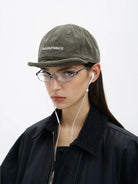MASONPRINCE Twisted Design Flat Top Cap in Olive - On Model