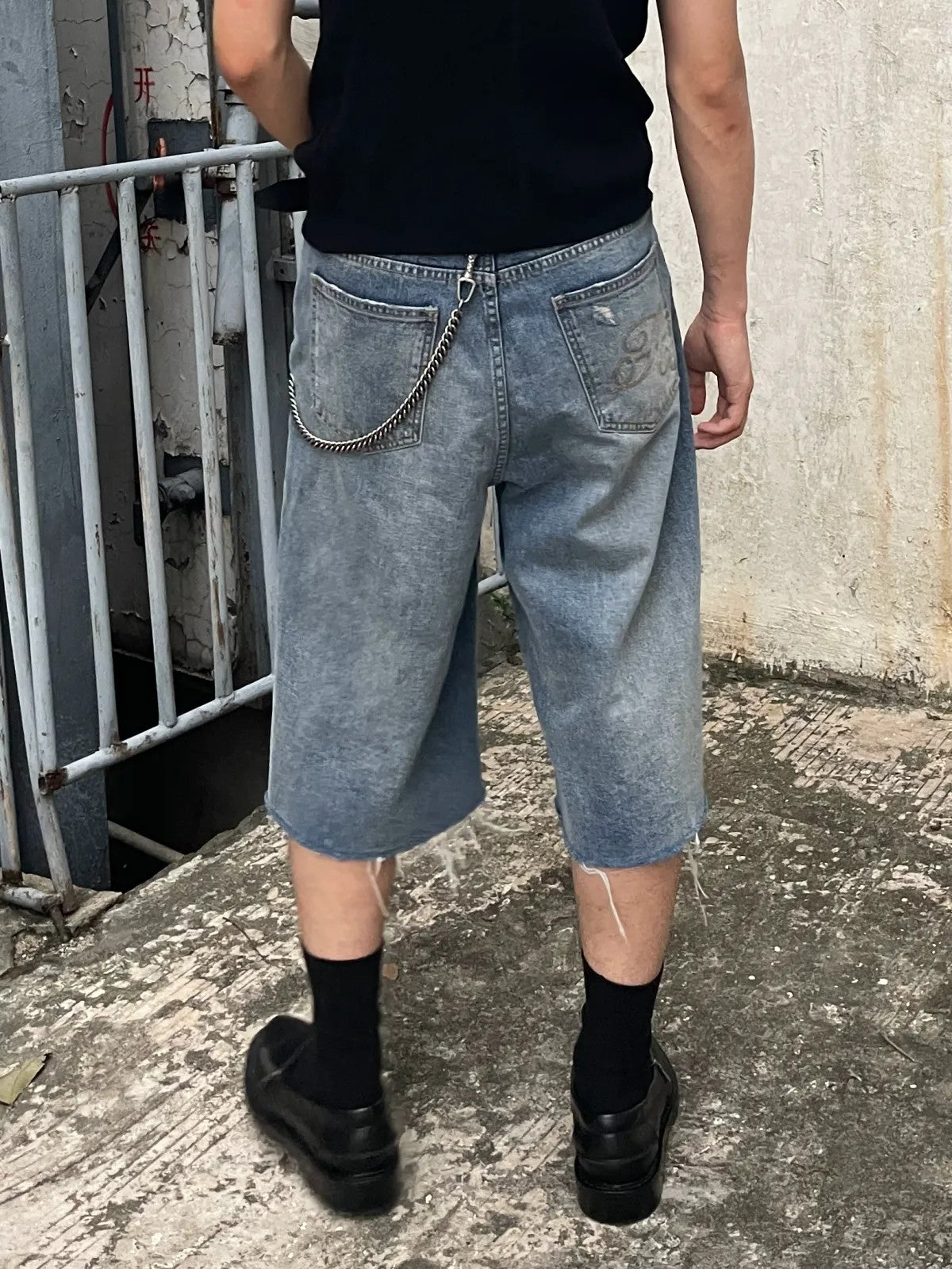 AFterTaste Heavy Distressed Long Denim Shorts in Denim - On Model