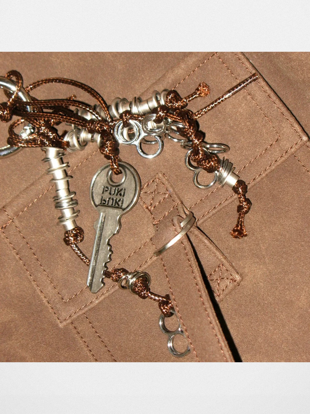 PUKI Reversible Faux Suede Plaid Hobo in Brown - Detail