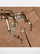 PUKI Reversible Faux Suede Plaid Hobo in Brown - Detail