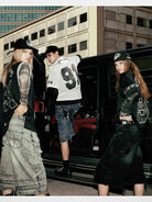 BADSEED Distressed Denim Bermuda Shorts in Medium Blue - On Model