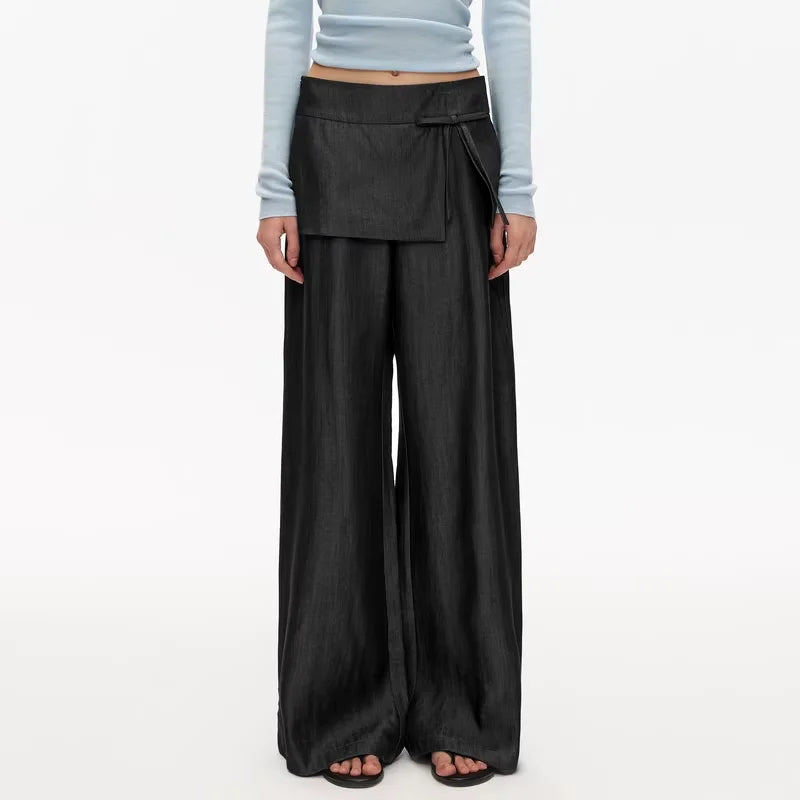 PUKI High-Waisted Wide-Leg Pants with Skirt Overlay and Bow Detail