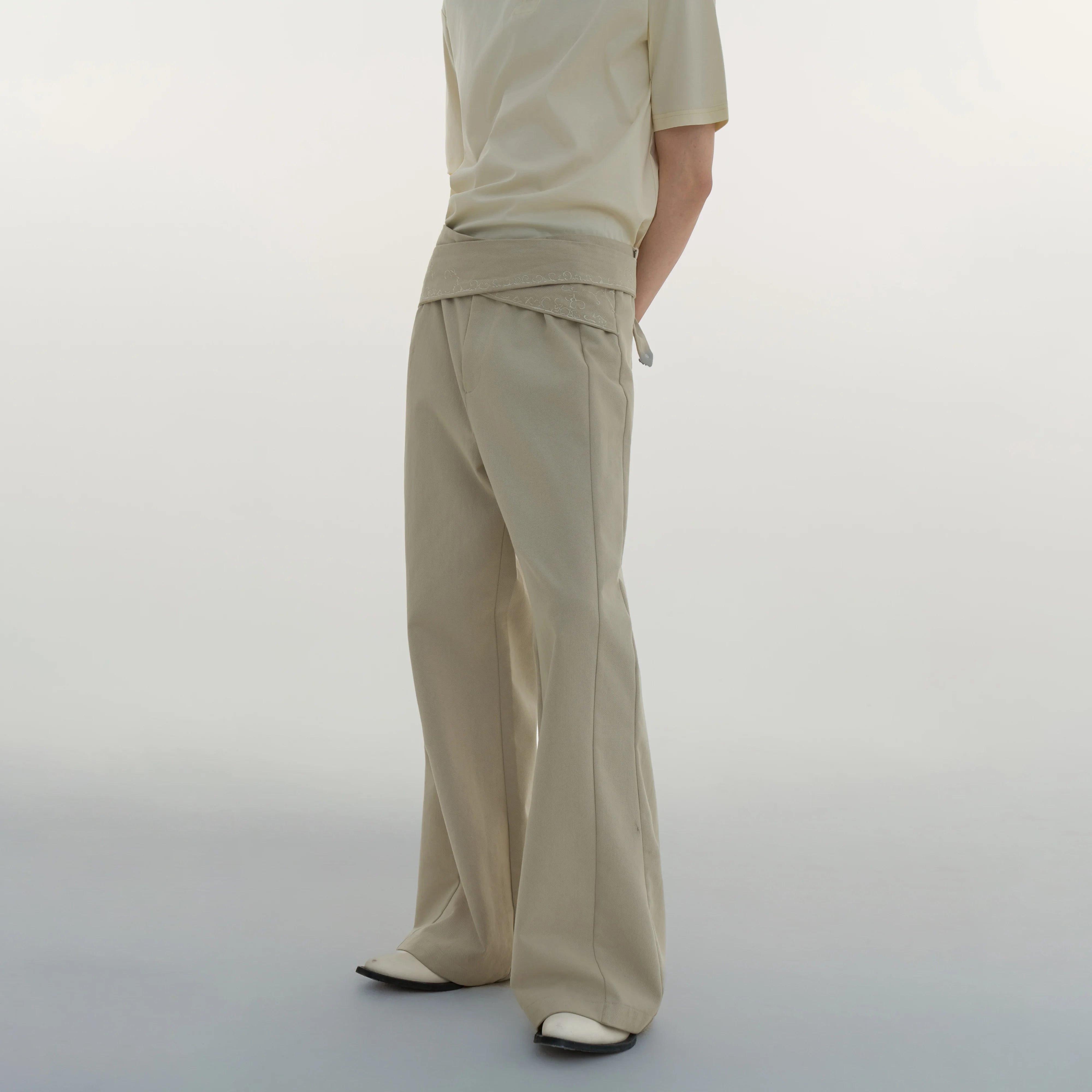 Y OFFICIAL Strap-Detail Flared Faux Denim Trousers